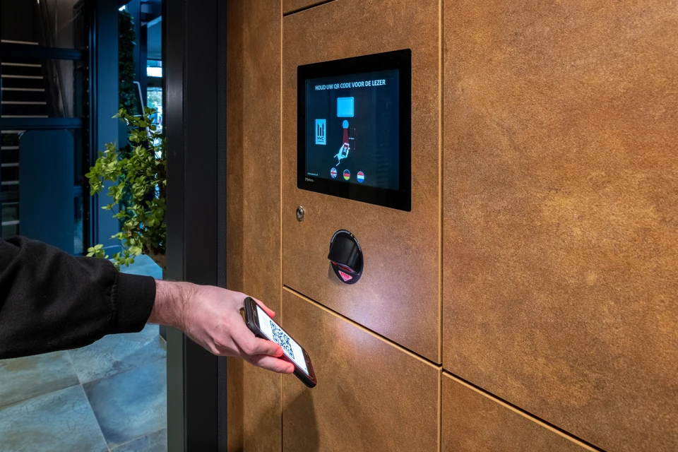 Metra locker access terminal with a user presenting a credential